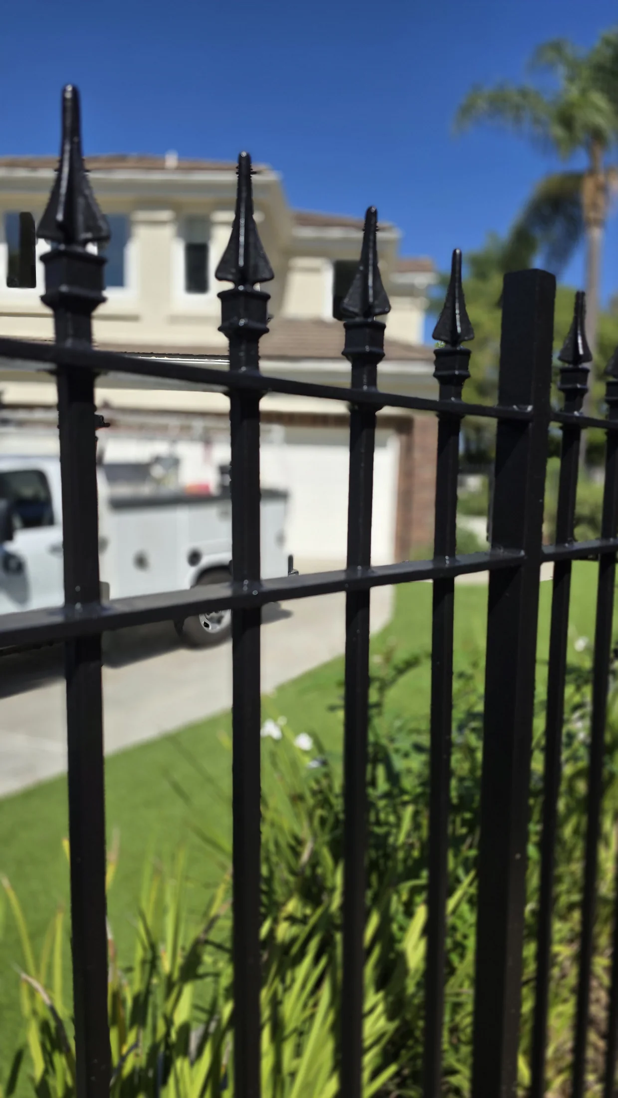 Restored black iron fence detail at Turtle Rock Summit